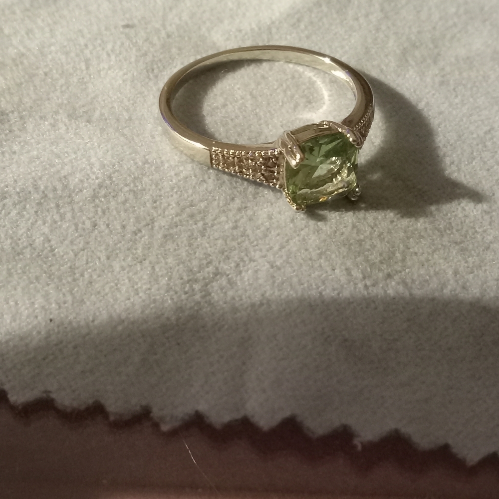 Elegant Silver Ring with Light BlueGemstone